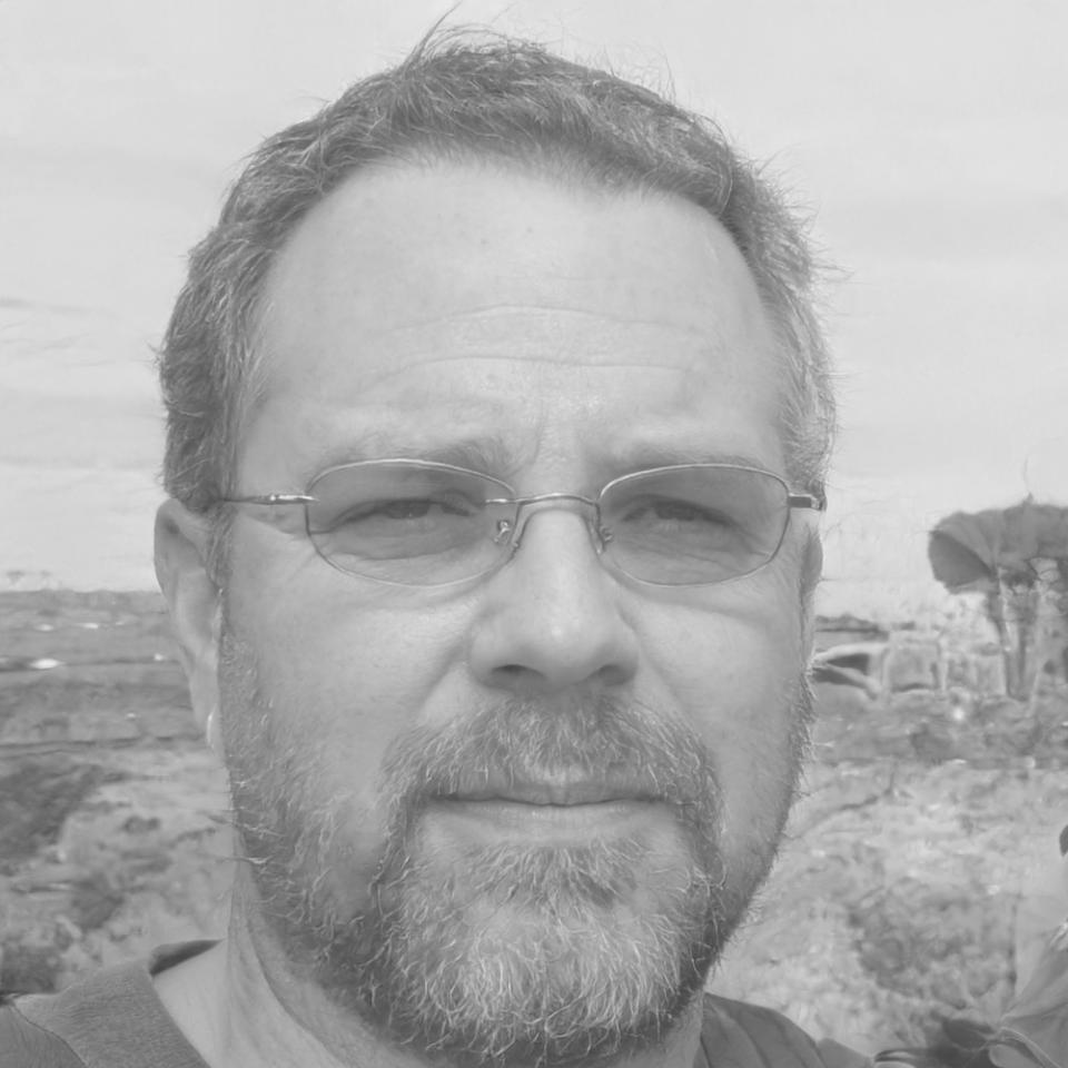 Professional headshot of James Robertson